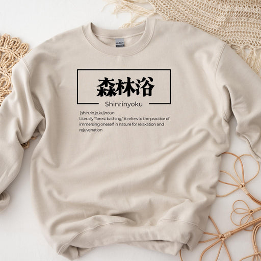 a sweatshirt with the words shinmyoku written on it