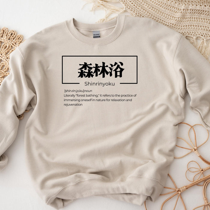 a sweatshirt with the words shinmyoku written on it