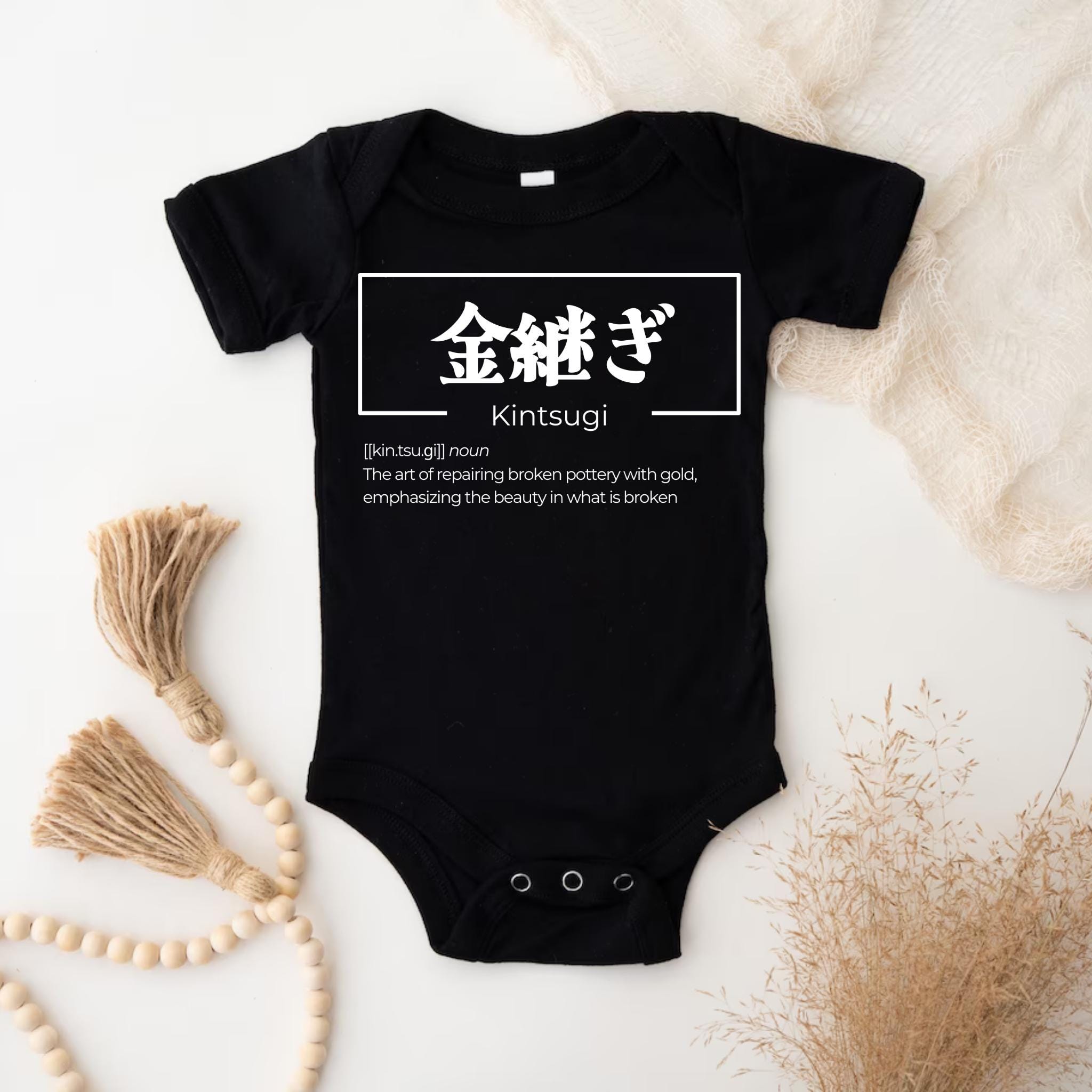 a black bodysuit with a chinese writing on it