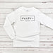 a white shirt with japanese writing on it