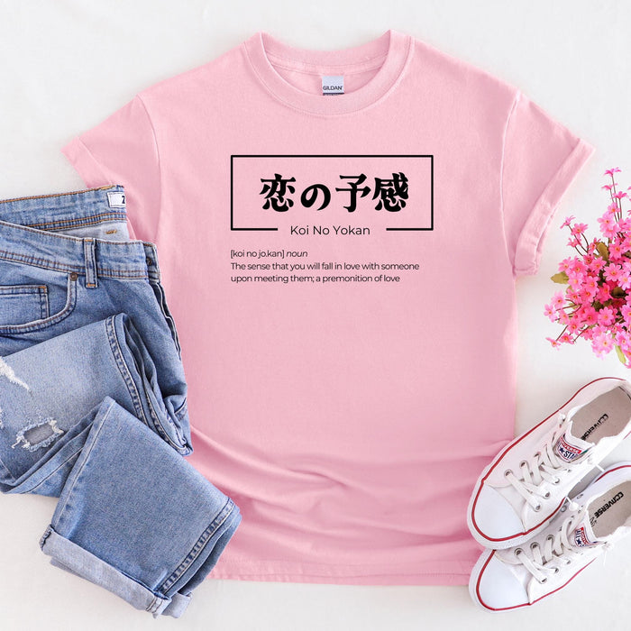 a pink t - shirt with japanese characters on it