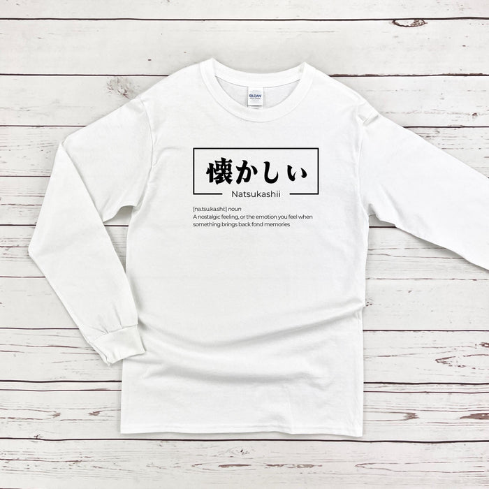 a white long - sleeved shirt with japanese characters on it