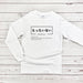 a white long sleeve shirt with japanese writing on it