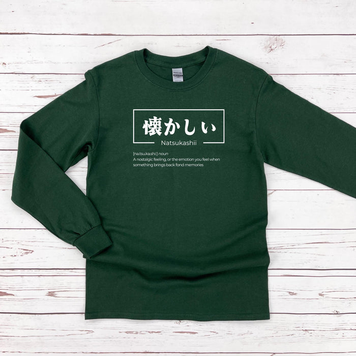a green long - sleeved shirt with japanese characters on it