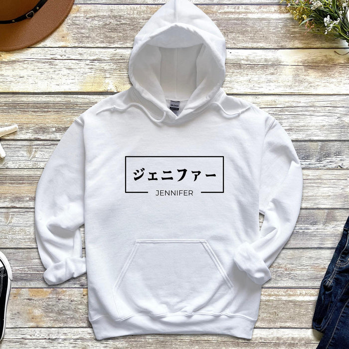 a white hoodie with japanese writing on it