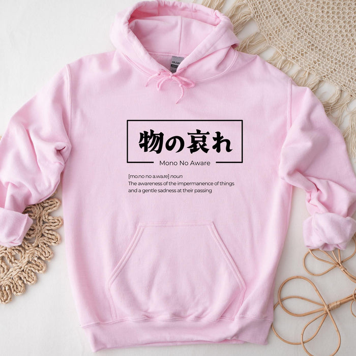 a pink hoodie with chinese writing on it