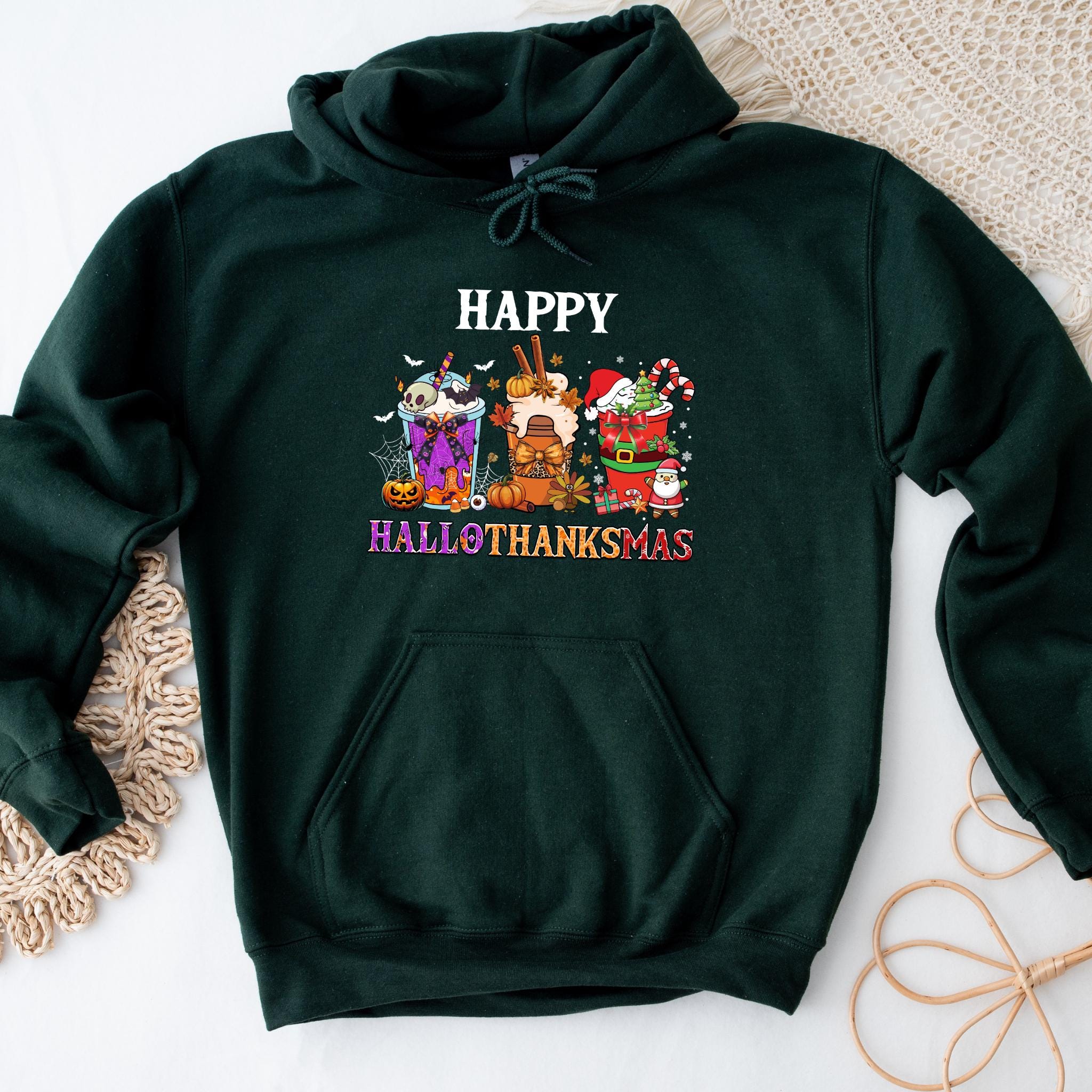 a green sweatshirt with a happy thanksgiving design on it