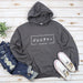 a gray hoodie with japanese characters on it