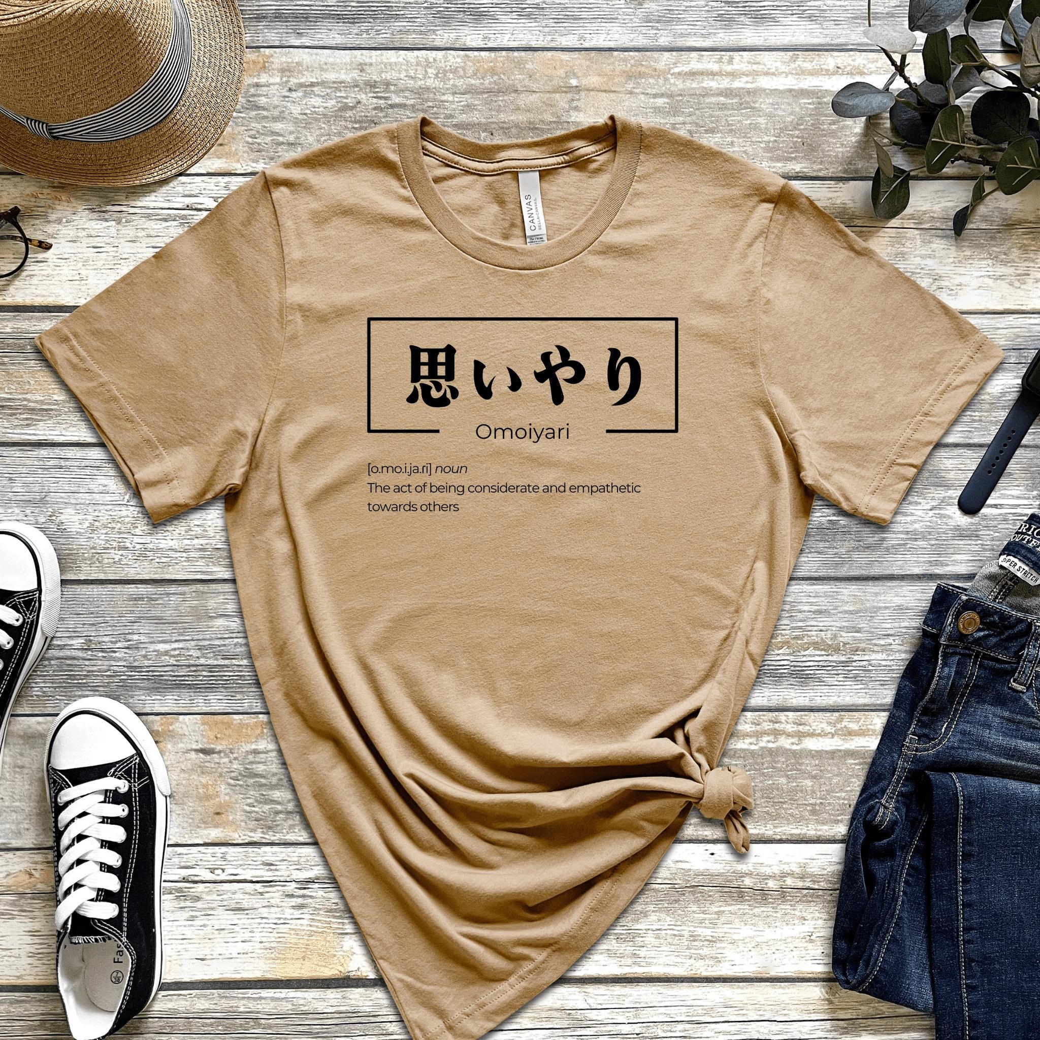a tan t - shirt with a japanese writing on it