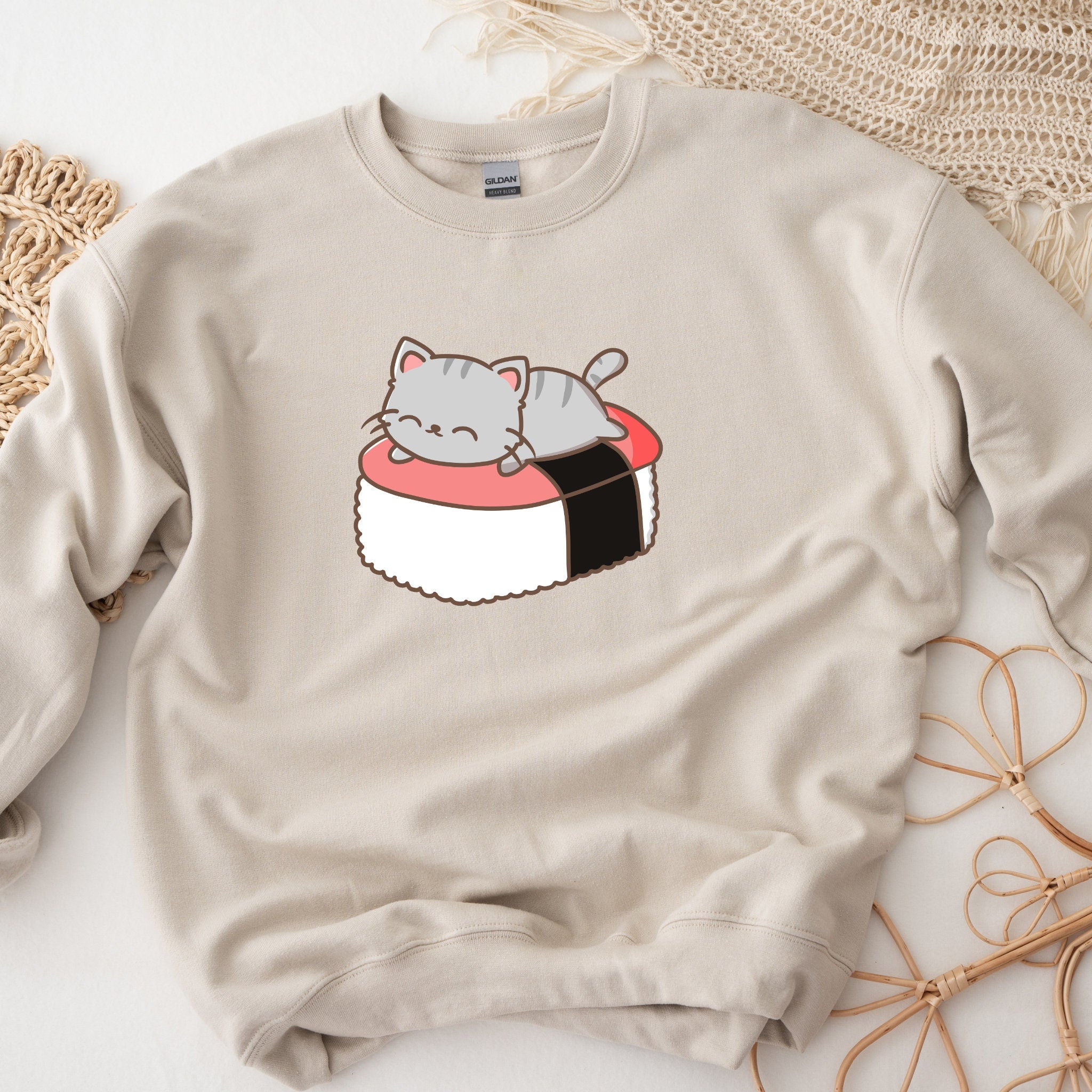 Cat Napping on Sushi Unisex Sweatshirt