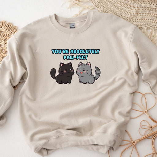 a white sweatshirt with two cats on it