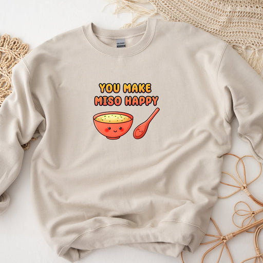 a sweatshirt with a bowl of soup and a spoon on it