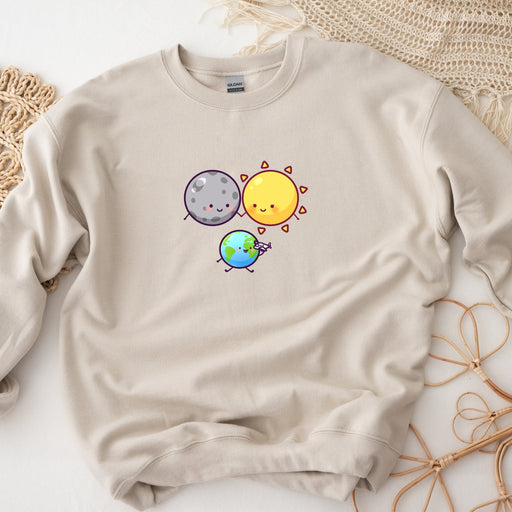a sweatshirt with a picture of the earth and sun on it