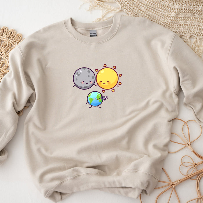 a sweatshirt with a picture of the earth and sun on it