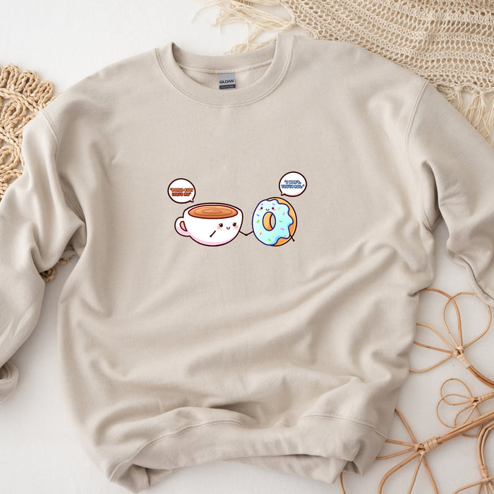 a sweatshirt with a picture of coffee and donuts on it