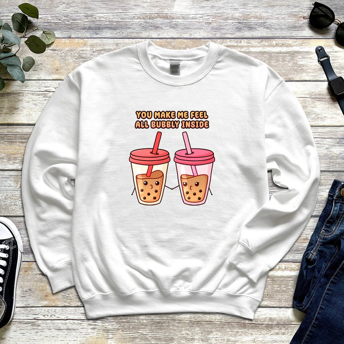 a white sweatshirt with two cups of coffee on it