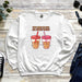 a white sweatshirt with two cups of coffee on it