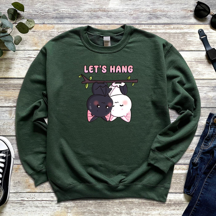 a green sweatshirt with an image of two dogs on it