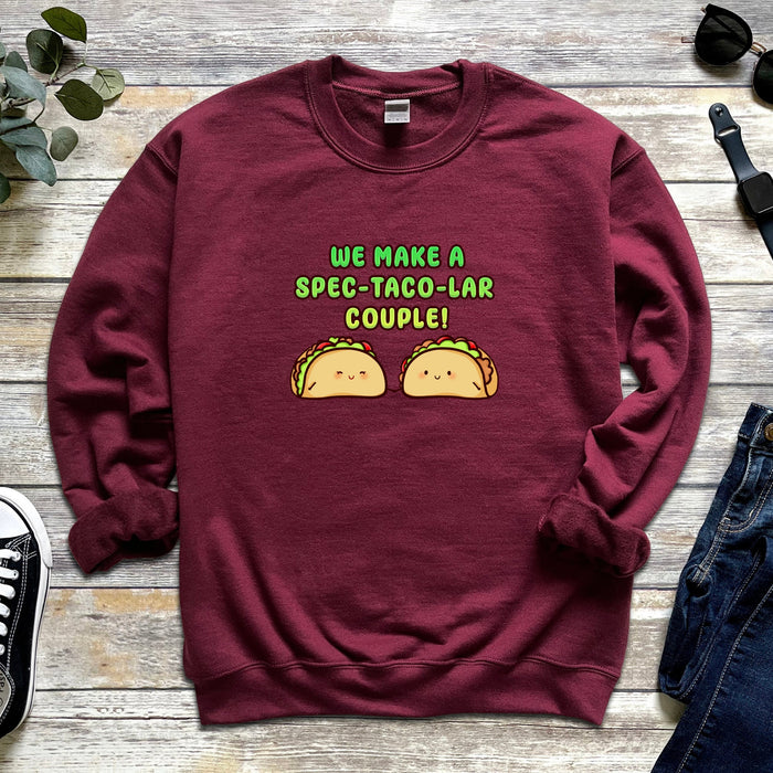a red sweatshirt with two tacos on it