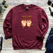 a maroon sweatshirt with two owls saying you&#39;re a hoot to be with