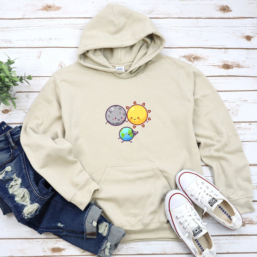 a sweatshirt with a sun and a planet on it