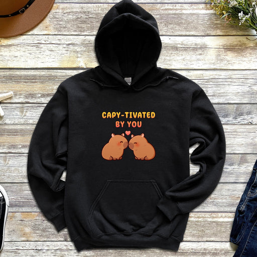 a black hoodie with a picture of a couple of cats saying capt - ti