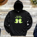 a black hoodie with two green dinosaurs on it