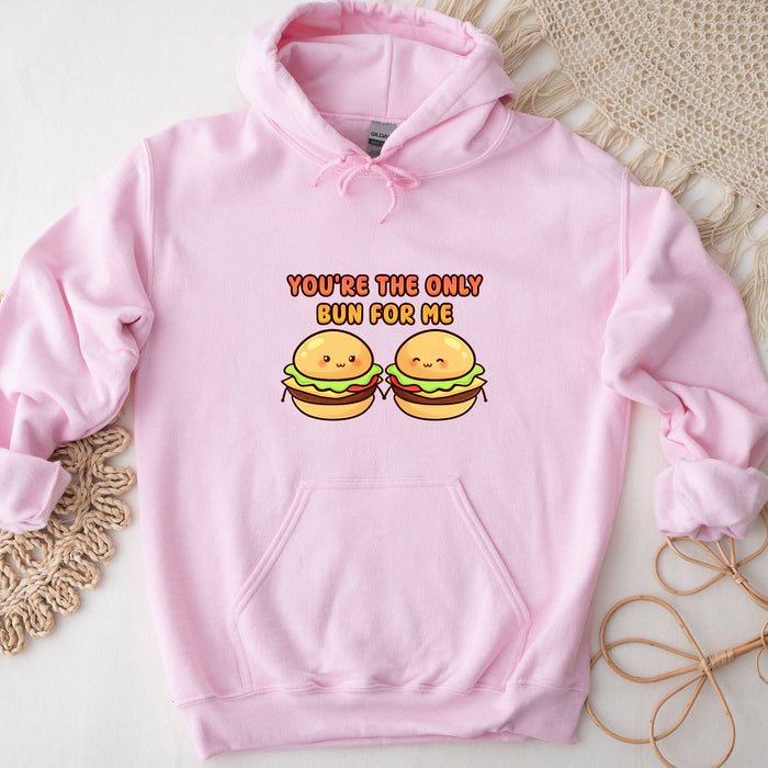 a pink hoodie with two hamburgers on it