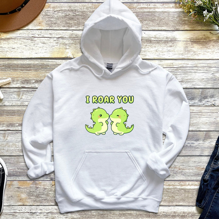a white hoodie with the words i roar you printed on it