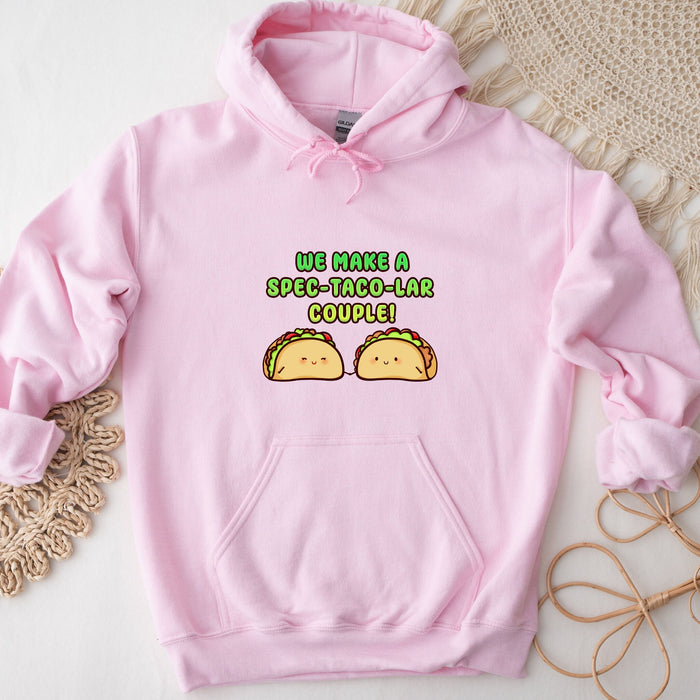 a pink hoodie with two tacos on it