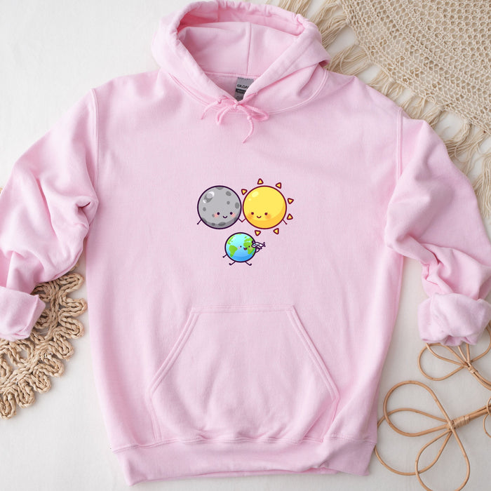 a pink hoodie with an image of a sun and a planet on it