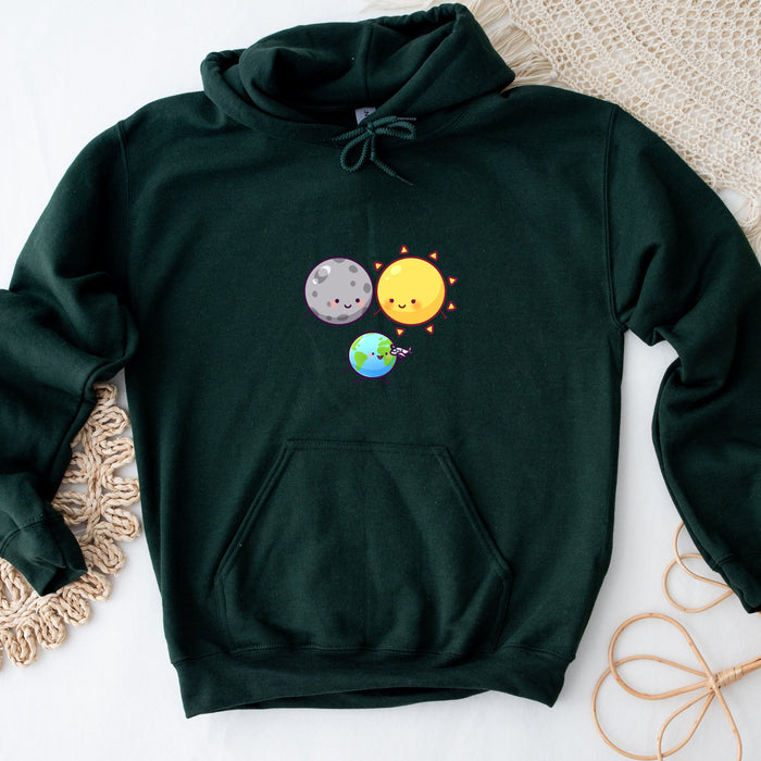 a green sweatshirt with a picture of two planets on it