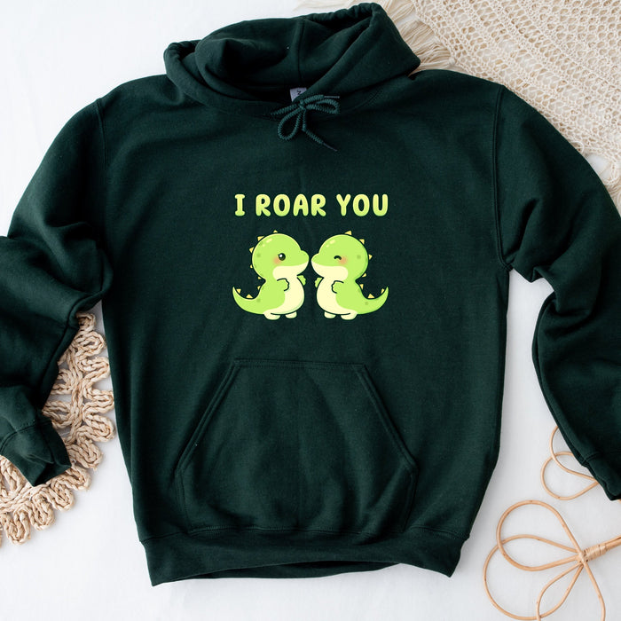 a green sweatshirt with two green birds on it