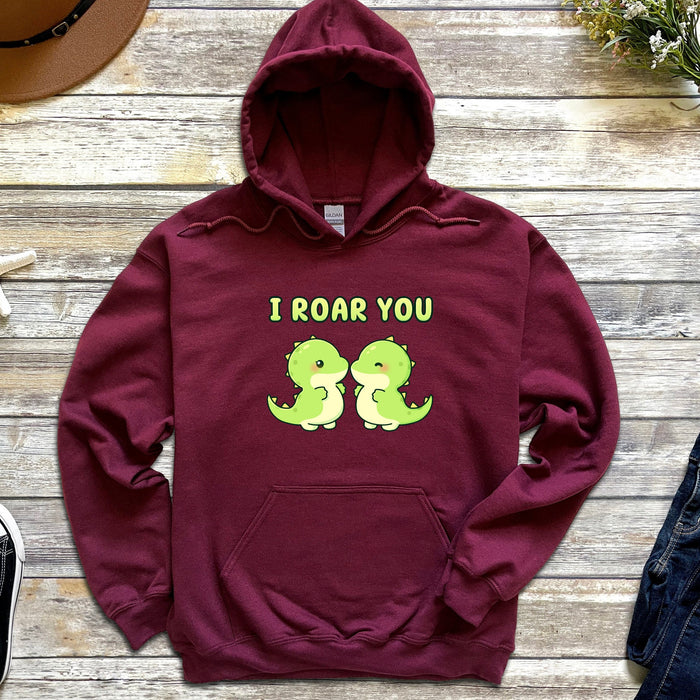 a red sweatshirt with the words i roar you on it