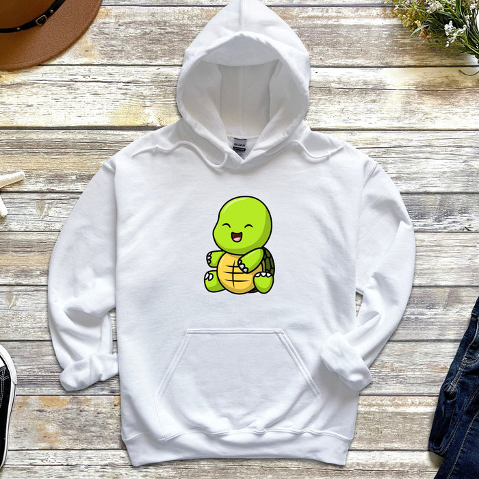 a white hoodie with a green turtle on it