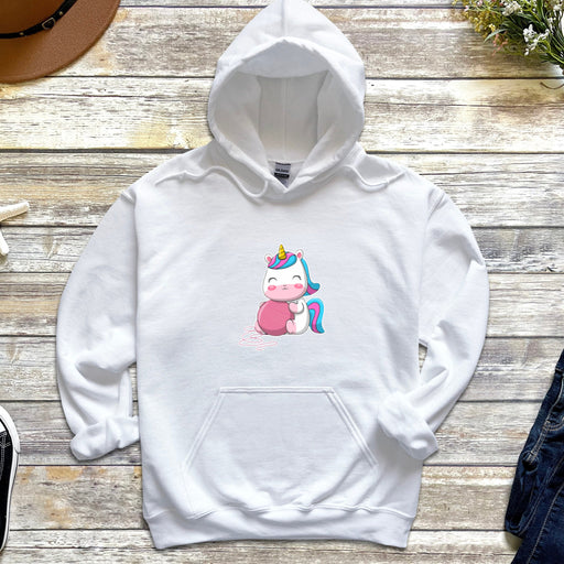 a white hoodie with a unicorn on it