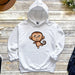 a white hoodie with a cartoon monkey on it