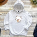a white hello kitty hoodie with a coffee cup on it