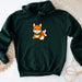 a green hoodie with a picture of a fox on it