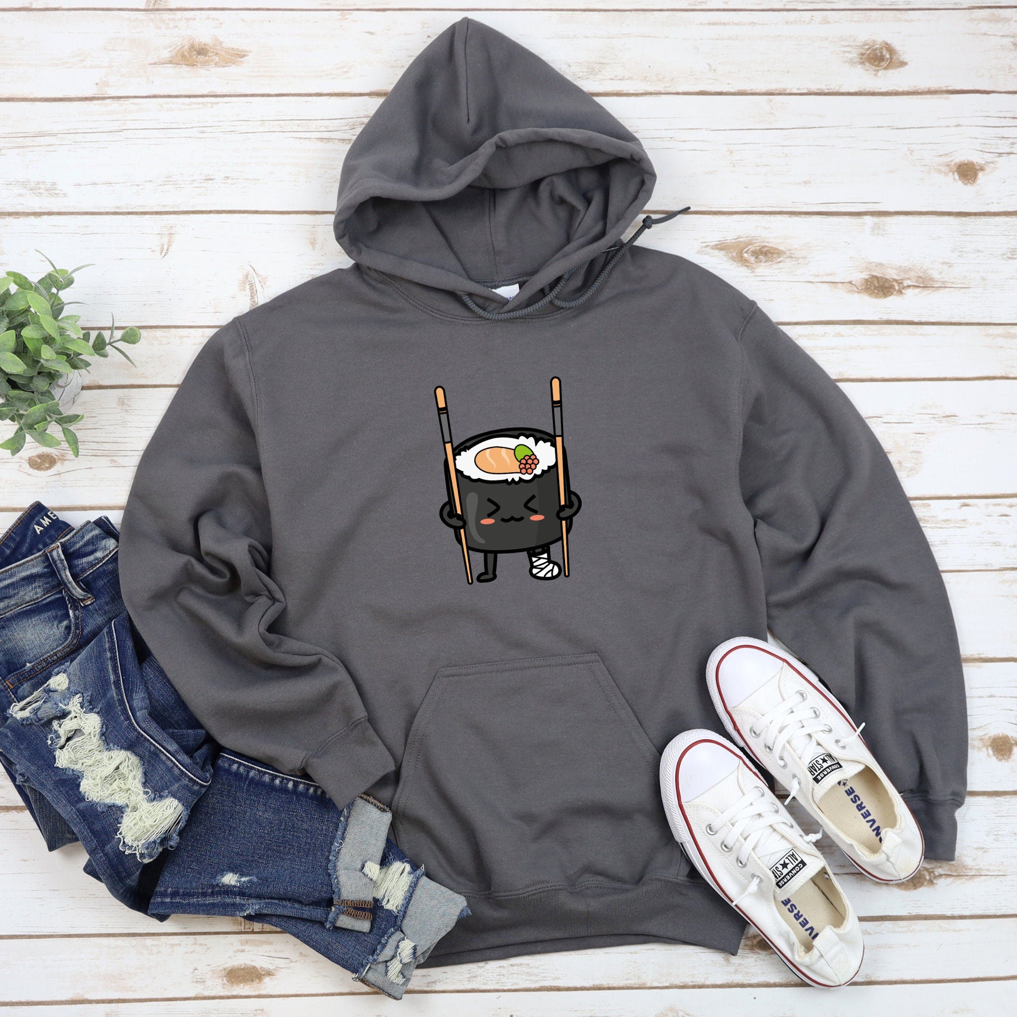 a gray hoodie with a sushi on it