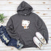 a gray hoodie with a white bear on it