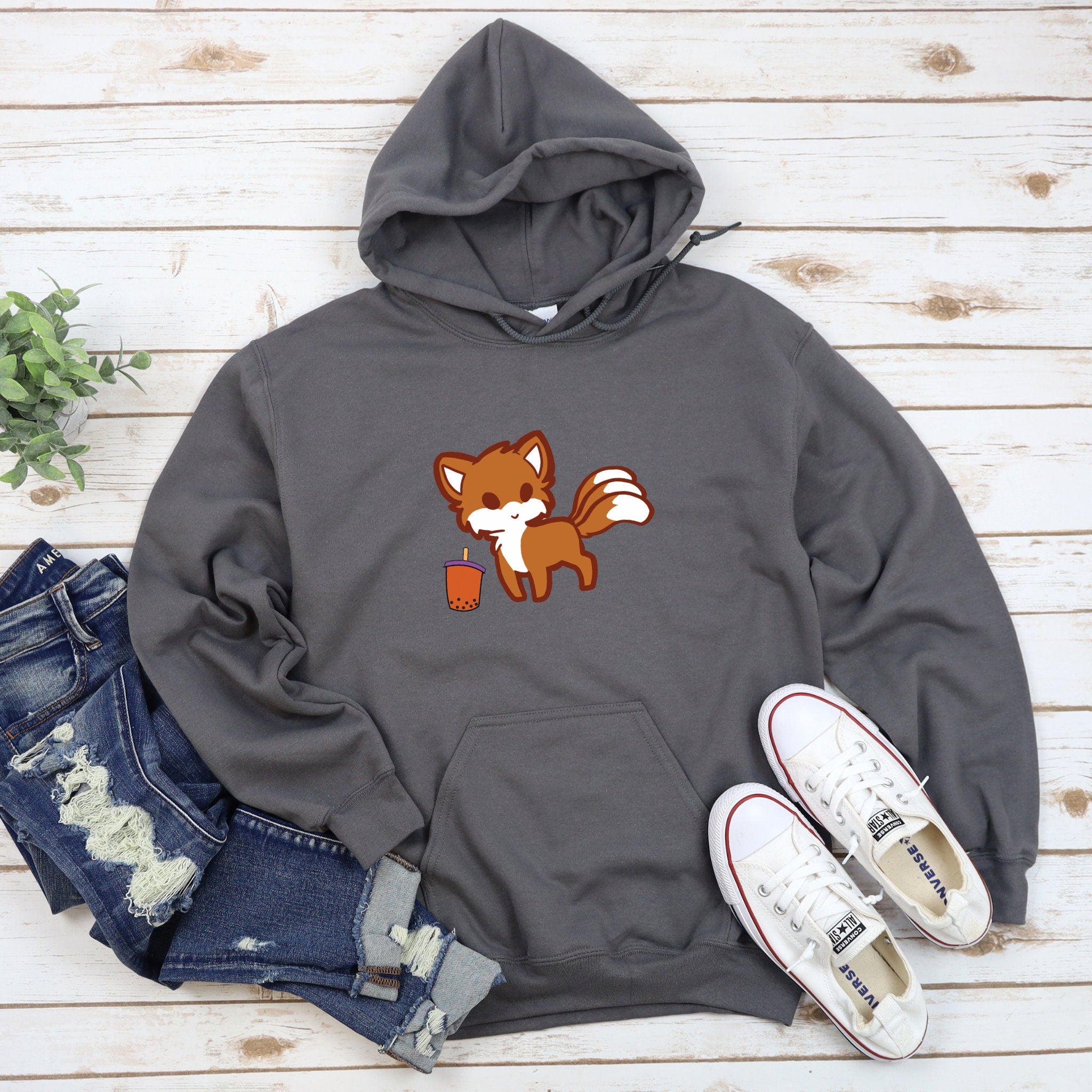 a gray hoodie with a red fox on it