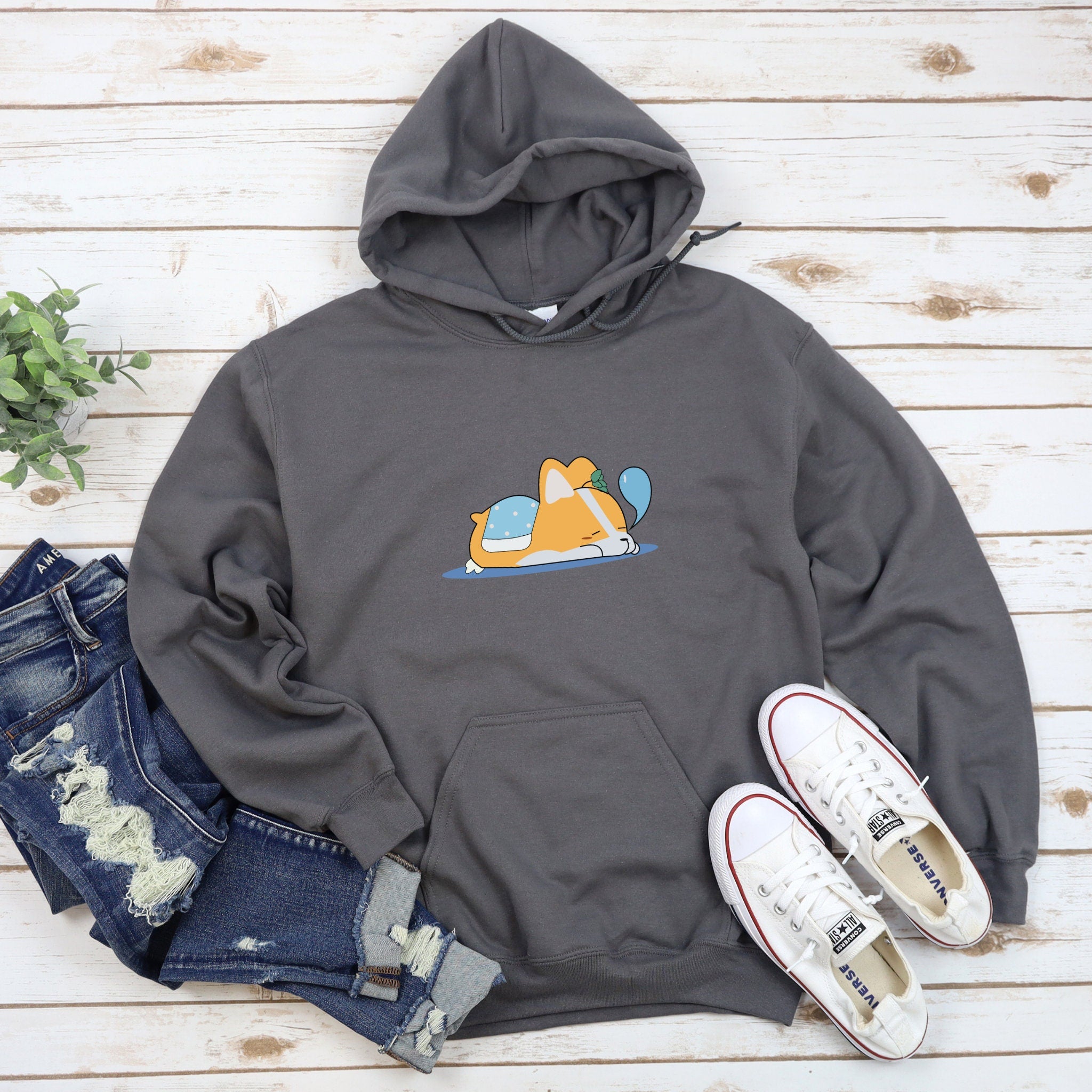 a gray hoodie with a dog on it