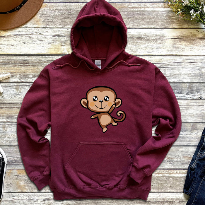 a maroon hoodie with a cartoon monkey on it