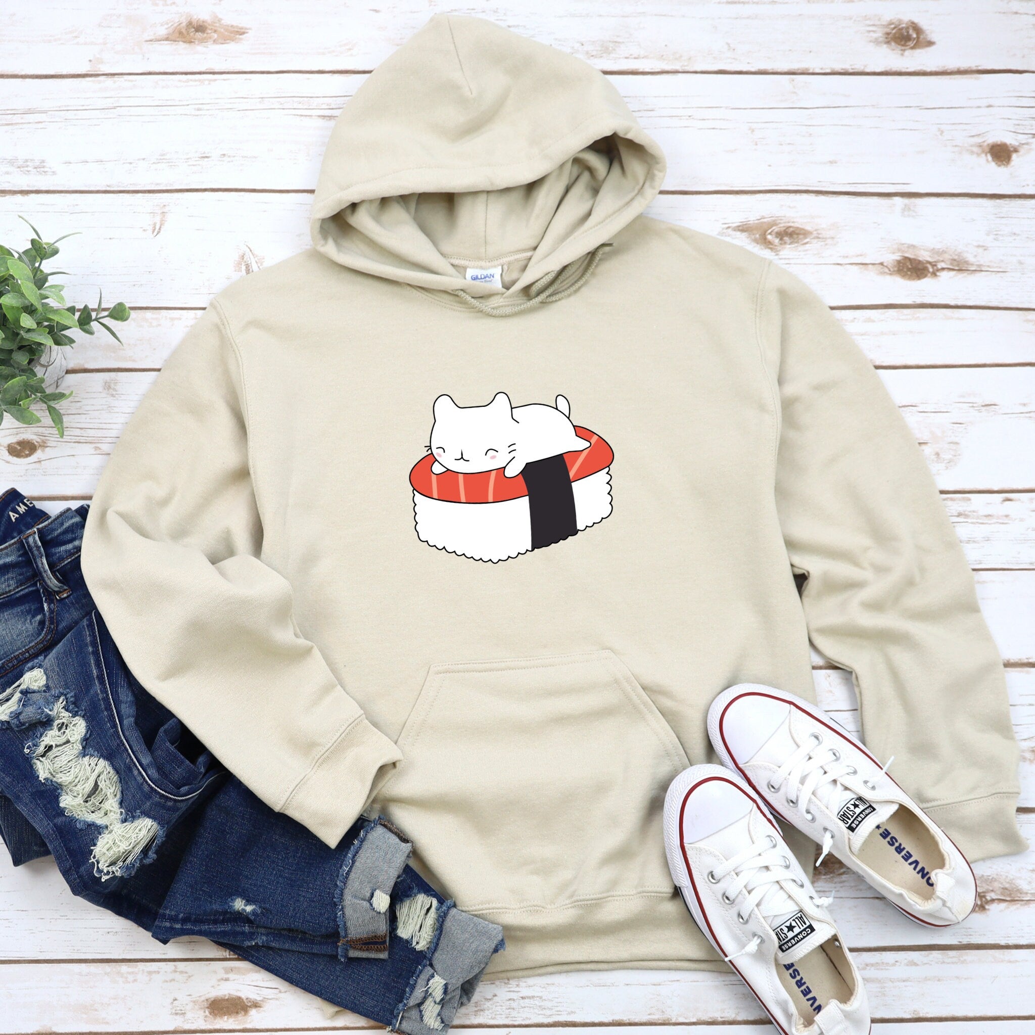 a sweatshirt with a sushi cat on it