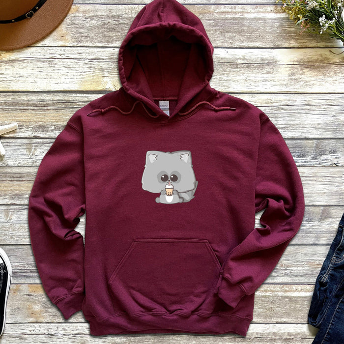 a red sweatshirt with a koala on it