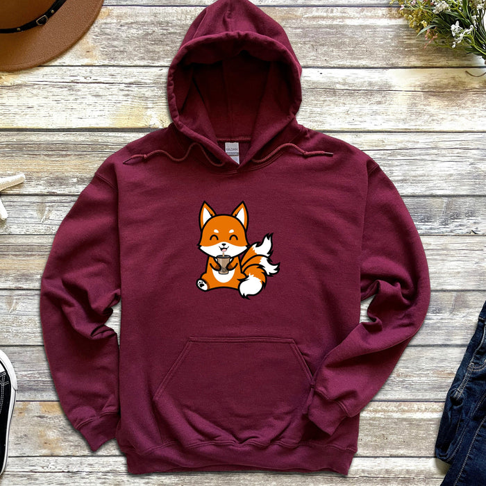 a red hoodie with a cartoon fox on it