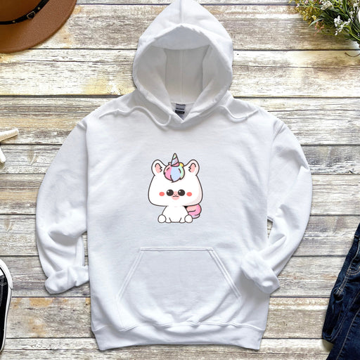a white hoodie with a unicorn on it