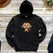 a black hoodie with a cartoon monkey on it