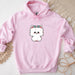 a pink sweatshirt with a picture of a dog on it